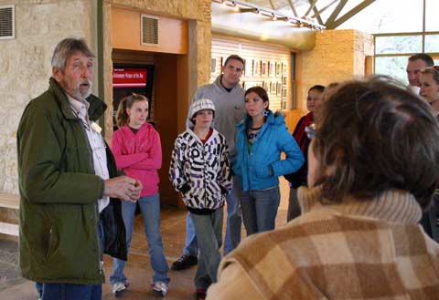John Ahrns orients the tour participants at the Visitors' Center